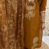 brown2 A Brown Printed Kurti Set With A Matching Dupatta And Tassel Neckline
