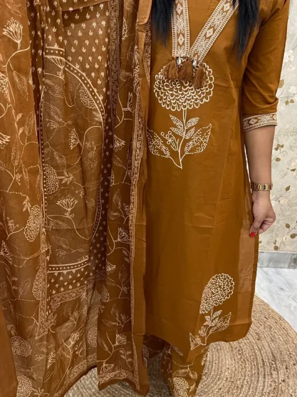 brown2 A Brown Printed Kurti Set With A Matching Dupatta And Tassel Neckline