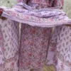 A Lavender Floral-Print Ethnic Suit Featuring A Button-Detailed Kurta, Matching Trousers, And A Patterned Dupatta